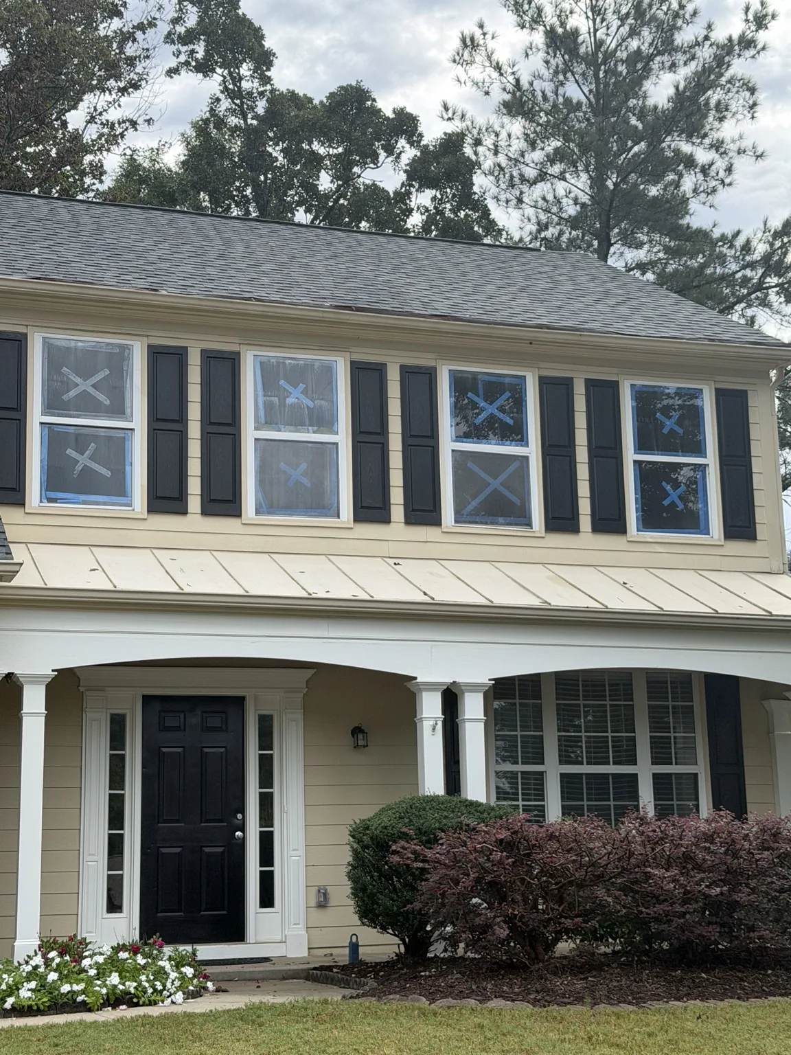 House windows before glass replacement with marked panes
